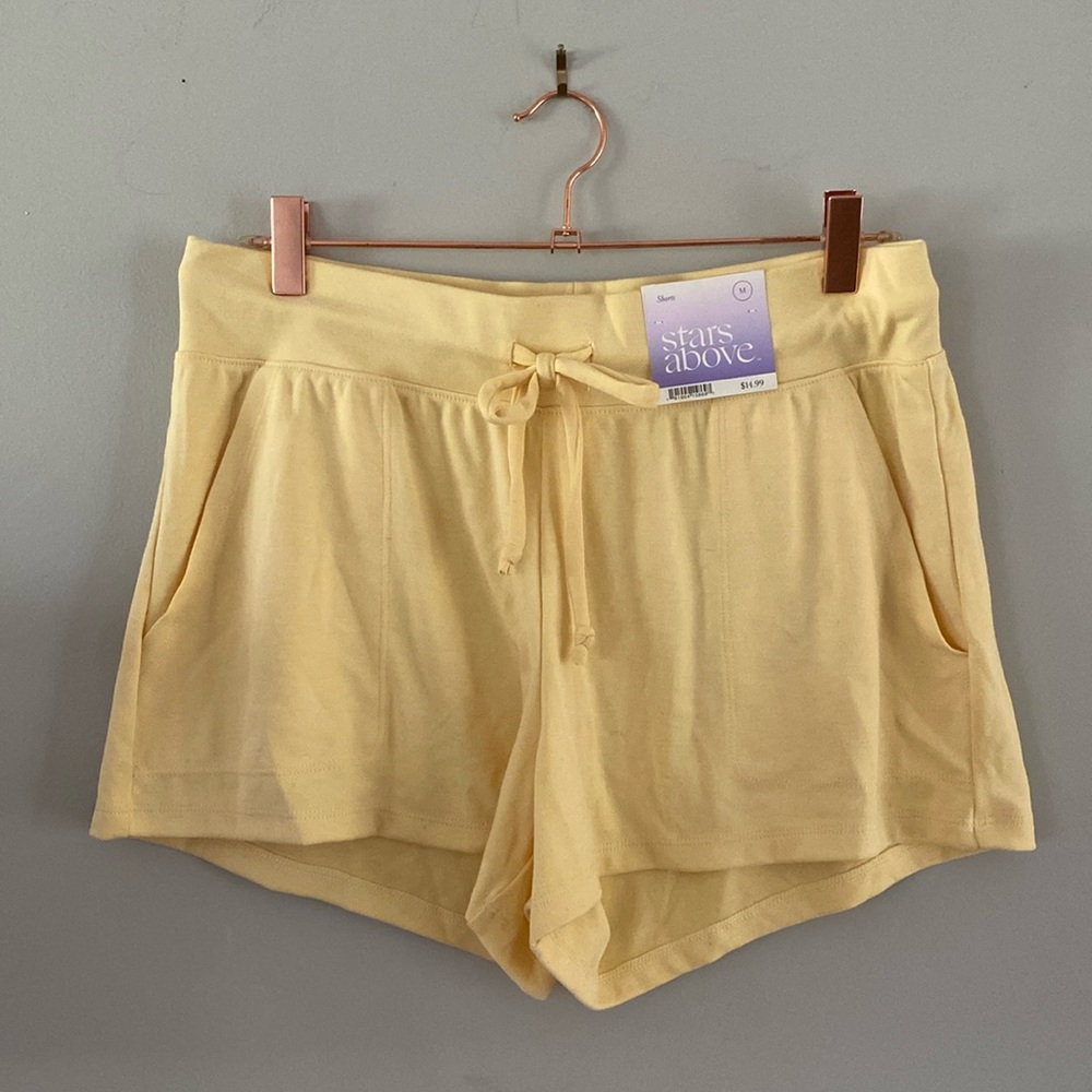stars above yellow shorts